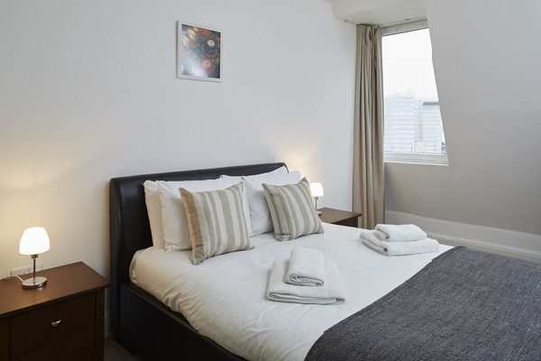 Vauxhall Serviced Apartments South London | Urban Stay Vauxhall-Serviced-Apartments-South-London-Urban-Stay---Bedroom-with-Window