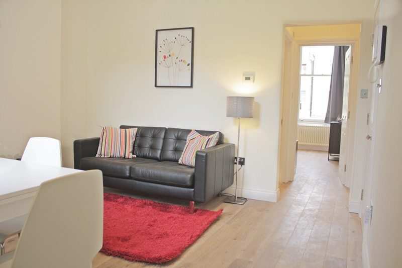 Cambridge Gardens Serviced Accommodation Notting Hill London – Urban Stay Cambridge-Gardens-Serviced-Accommodation-Notting-Hill-London---Urban-Stay---living-room-wood-flooring