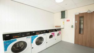 Park House Luton Serviced Apartments UK - Urban Stay corporate accommodation - communal laundry