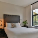 Cardiff Serviced Apartments- Book Short Let Luxury 4* Accommodation near Cardiff University, Cardiff Castle & Bute Park with Aircon, Lift, Wifi & Smart TV!