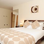 City Centre Serviced Apartments Cardiff - Corporate Short Let Accommodation Cardiff with Pool, Gym, Sauna, Parking, Lift & Balcony | Urban Stay