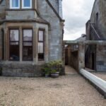 Experience exquisite accommodation near Troon Golf Club at St Meddans Mews. Enjoy optimal comfort for your golfing getaway.| Urban Stay