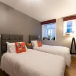 Executive Apartments Manchester, a boutique aparthotel in Manchester's Northern Quarter, offers stylish 1-bedroom apartments with unique warehouse features, free Wi-Fi, and complimentary laundry facilities. Book Now!