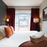 Executive Apartments Manchester, a boutique aparthotel in Manchester's Northern Quarter, offers stylish 1-bedroom apartments with unique warehouse features, free Wi-Fi, and complimentary laundry facilities. Book Now!