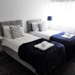 Discover comfort in Hillington Accommodation, Craigmuir Glasgow. Fully furnished, complimentary WiFi, and modern amenities. Reserve your stay now! | Urban Stay
