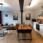 Executive Apartments Manchester, a boutique aparthotel in Manchester's Northern Quarter, offers stylish 1-bedroom apartments with unique warehouse features, free Wi-Fi, and complimentary laundry facilities. Book Now!