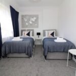 Book Renfrew Serviced Apartments for Corporate Short Lets today! This 3-bedroom Family Accommodation is near Glasgow Airport & Paisley centre | Urban Stay