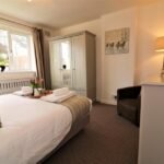 Our 2-Bedroom Short Let Apartments Glasgow are near Queen Elizabeth University Hospital and Ibrox Stadium. Ideal for sports fans! Book now Urban Stay