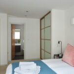 Hammersmith Short-Lets Accommodations showcases expert interior design with contemporary, comfortable furnishings. ideal for relaxation. Book Now +44 (0) 208 691 3920