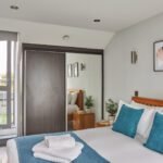 Short Let Apartments Wembley Jenga Court  has Lounge with a sofa and Smart TV for relaxation, and enjoy fully-equipped kitchens. Contact us. (0)208691 3920.