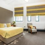 Discover Ainscow Serviced Apartments for premium extended stay accommodation. Ideal for business and leisure with modern amenities. | Urban Stay