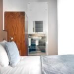 Discover Ainscow Serviced Apartments for premium extended stay accommodation. Ideal for business and leisure with modern amenities. | Urban Stay