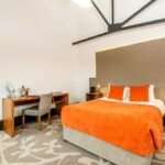 Discover Ainscow Serviced Apartments for premium extended stay accommodation. Ideal for business and leisure with modern amenities. | Urban Stay