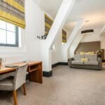 Discover Ainscow Serviced Apartments for premium extended stay accommodation. Ideal for business and leisure with modern amenities. | Urban Stay