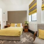 Discover Ainscow Serviced Apartments for premium extended stay accommodation. Ideal for business and leisure with modern amenities. | Urban Stay