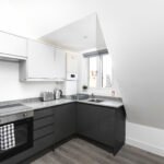 Serviced apartments in Enfield with Wi-Fi, kitchen, parking, and fast train links to London. Book your stay now.