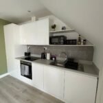 Chertsey Serviced Apartments with parking near Thorpe Park, Heathrow, and London. Perfect for business and leisure stays in Surrey.