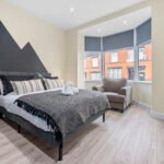 Book Salford Manchester Short Lets. Spacious 4-bedroom house with WiFi, parking, and  transport links to MediaCityUK & Manchester city centre.