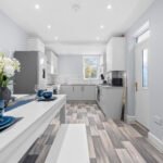 Book Salford Manchester Short Lets. Spacious 4-bedroom house with WiFi, parking, and  transport links to MediaCityUK & Manchester city centre.