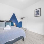 Book Salford Manchester Short Lets. Spacious 4-bedroom house with WiFi, parking, and  transport links to MediaCityUK & Manchester city centre.