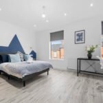 Book Salford Manchester Short Lets. Spacious 4-bedroom house with WiFi, parking, and  transport links to MediaCityUK & Manchester city centre.