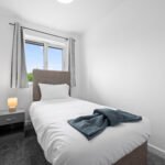 Spacious serviced apartments in Wigan with parking, Wi-Fi, and flexible beds. Ideal for business travellers, families, and short stays.