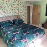 Book large pet friendly holiday cottages in Lincolnshire. This 6-bedroom house in Spalding is for up to 10 guests with parking and garden.