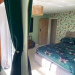 Book large pet friendly holiday cottages in Lincolnshire. This 6-bedroom house in Spalding is for up to 10 guests with parking and garden.