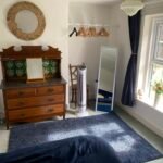 Book large pet friendly holiday cottages in Lincolnshire. This 6-bedroom house in Spalding is for up to 10 guests with parking and garden.