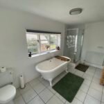 Book large pet friendly holiday cottages in Lincolnshire. This 6-bedroom house in Spalding is for up to 10 guests with parking and garden.