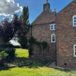Book large pet friendly holiday cottages in Lincolnshire. This 6-bedroom house in Spalding is for up to 10 guests with parking and garden.