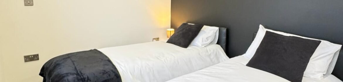 Stay in stylish Holiday Apartments West Yorkshire. Our 2-bed serviced apartments in Yeadon have parking, and easy transport to Leeds.