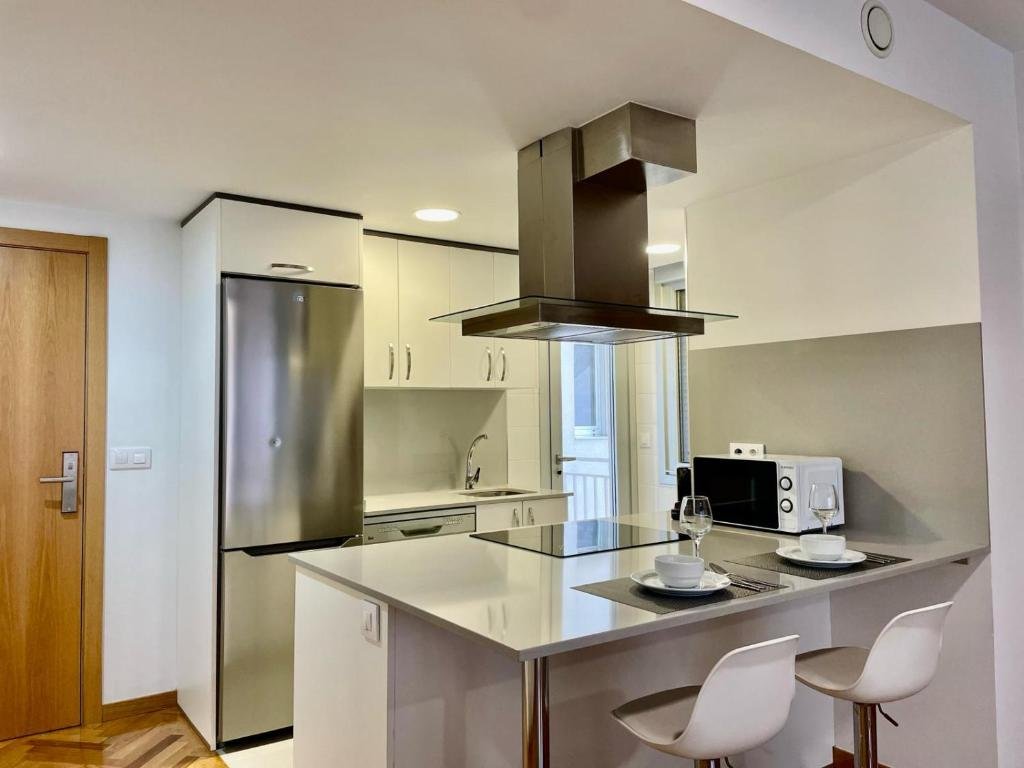 Serviced Apartments Vigo | Business Accommodation Galicia | Urban Stay Book-Serviced-Apartments-Vigo-in-central-Galicia.-Modern-corporate-accommodation-with-kitchens,-WiFi,-&-easy-access-to-Airport-&-transport.
