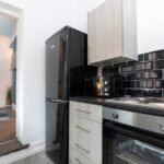 Stay at Group Accommodation in Gateshead. Spacious home near Newcastle with parking, transport links, and easy access to attractions & hubs.