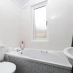 Stay at Group Accommodation in Gateshead. Spacious home near Newcastle with parking, transport links, and easy access to attractions & hubs.