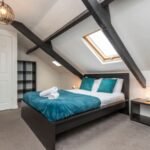 Stay at Group Accommodation in Gateshead. Spacious home near Newcastle with parking, transport links, and easy access to attractions & hubs.