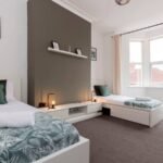 Stay at Group Accommodation in Gateshead. Spacious home near Newcastle with parking, transport links, and easy access to attractions & hubs.