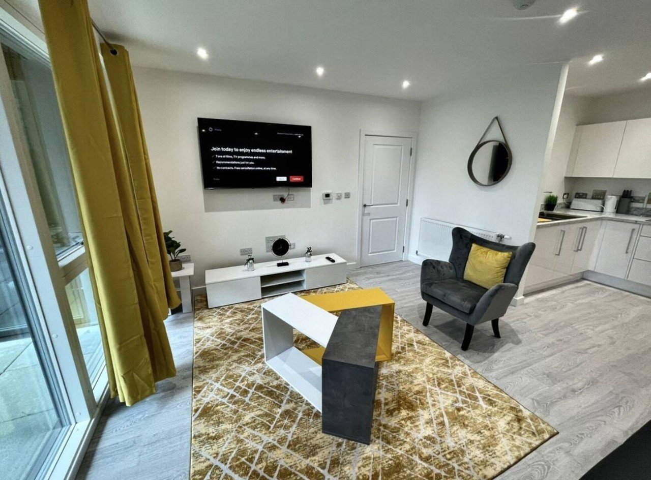 Bexleyheath Serviced Apartments | Corporate & Holiday Stays Book-Bexleyheath-Serviced-Apartments-with-free-parking,-gym-access,-balcony,-WiFi,-and-direct-rail-links-to-Canary-Wharf,-&-Central-London.
