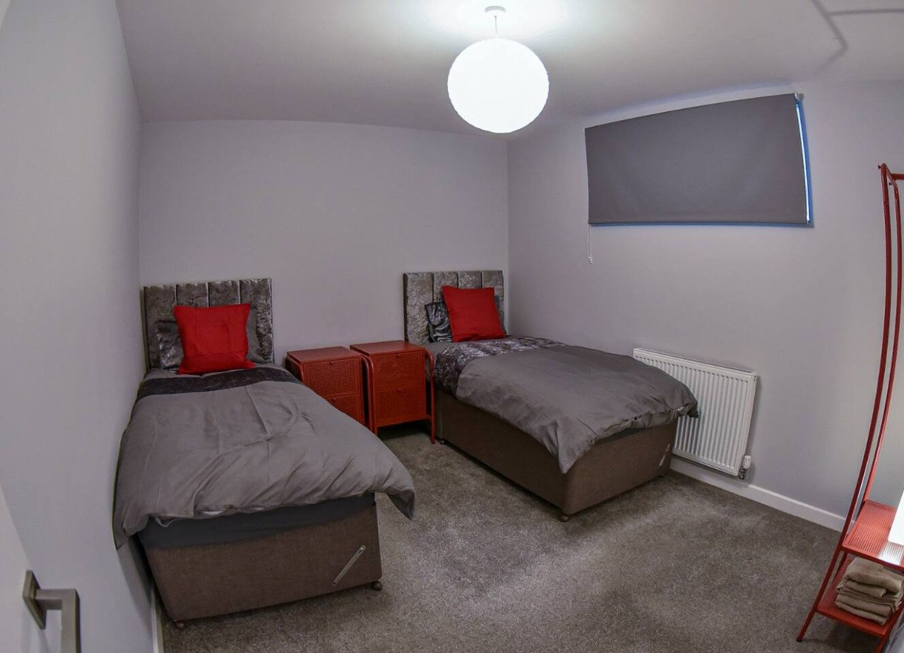 Warrington Accommodation | Short Lets for Contractors Urban Stay Book-Warrington-Accommodation-for-contractors-and-groups.-Ideal-for-short-let-apartments-and-extended-stays-near-Warrington-transport-links.