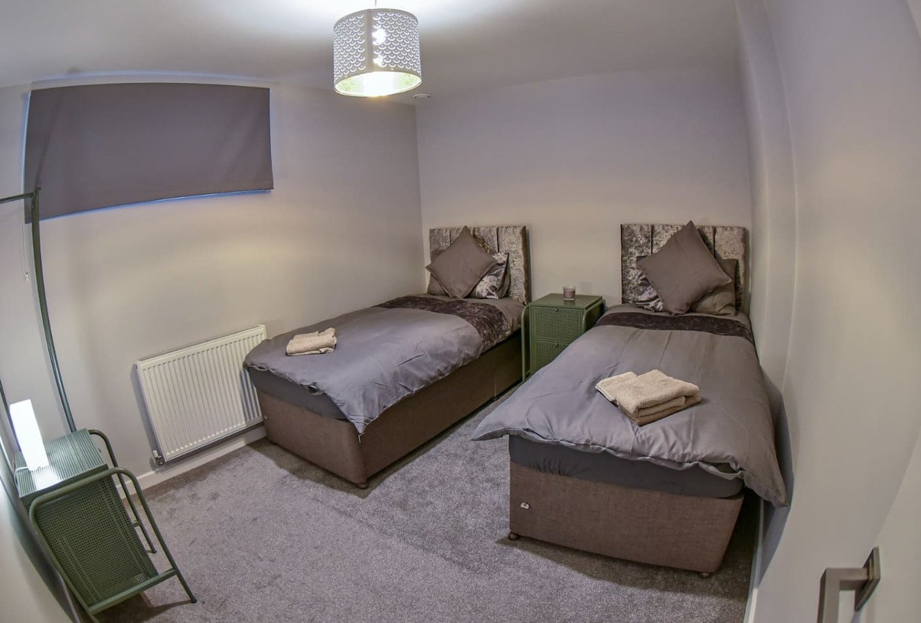 Warrington Accommodation | Short Lets for Contractors Urban Stay Book-Warrington-Accommodation-for-contractors-and-groups.-Ideal-for-short-let-apartments-and-extended-stays-near-Warrington-transport-links.