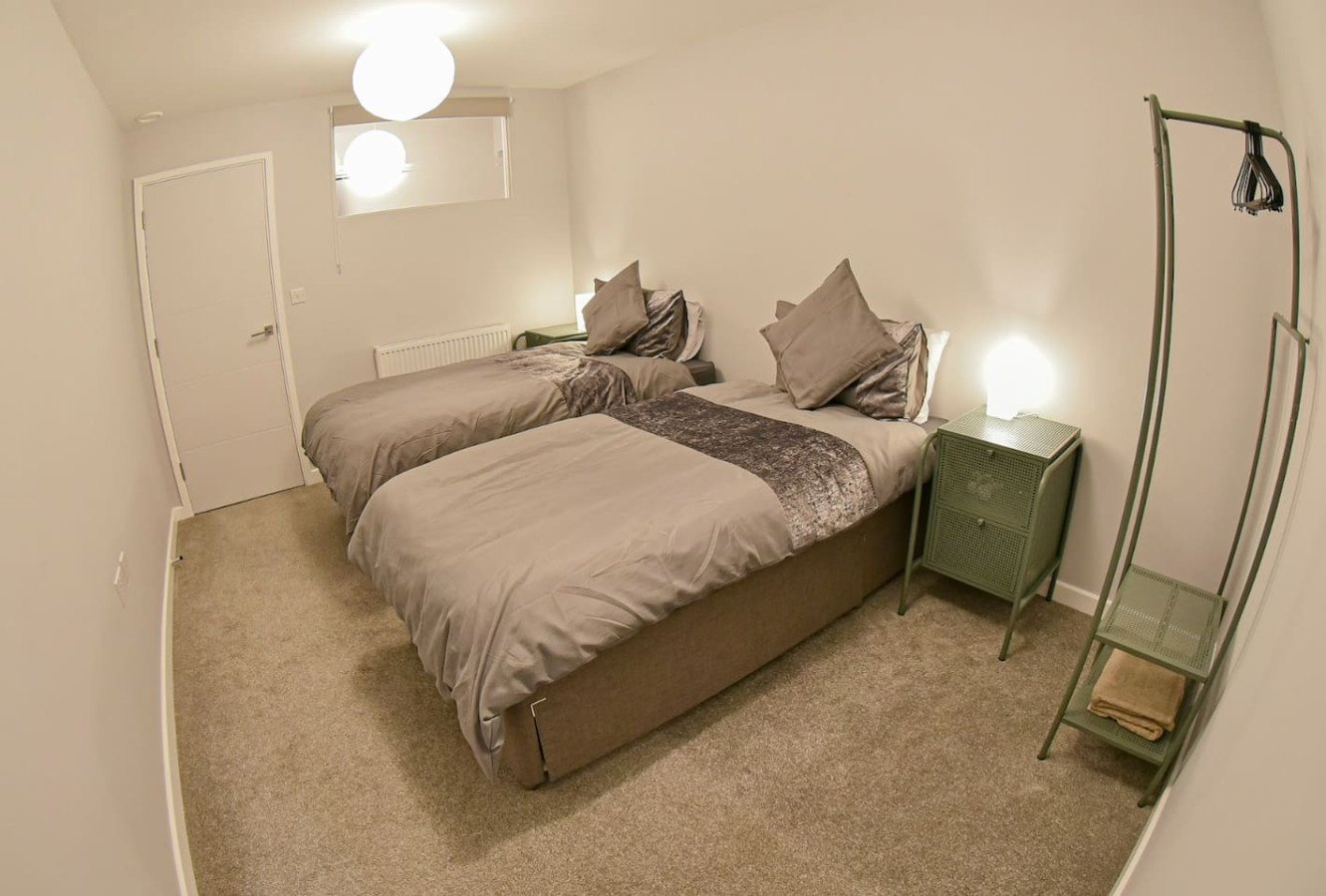 Warrington Accommodation | Short Lets for Contractors Urban Stay Book-Warrington-Accommodation-for-contractors-and-groups.-Ideal-for-short-let-apartments-and-extended-stays-near-Warrington-transport-links.