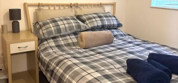 Book Northolt Accommodation West London with free parking, WiFi, and direct Central Line links to Wembley Stadium, & Central London.