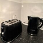 Book Northolt Accommodation West London with free parking, WiFi, and direct Central Line links to Wembley Stadium, & Central London.