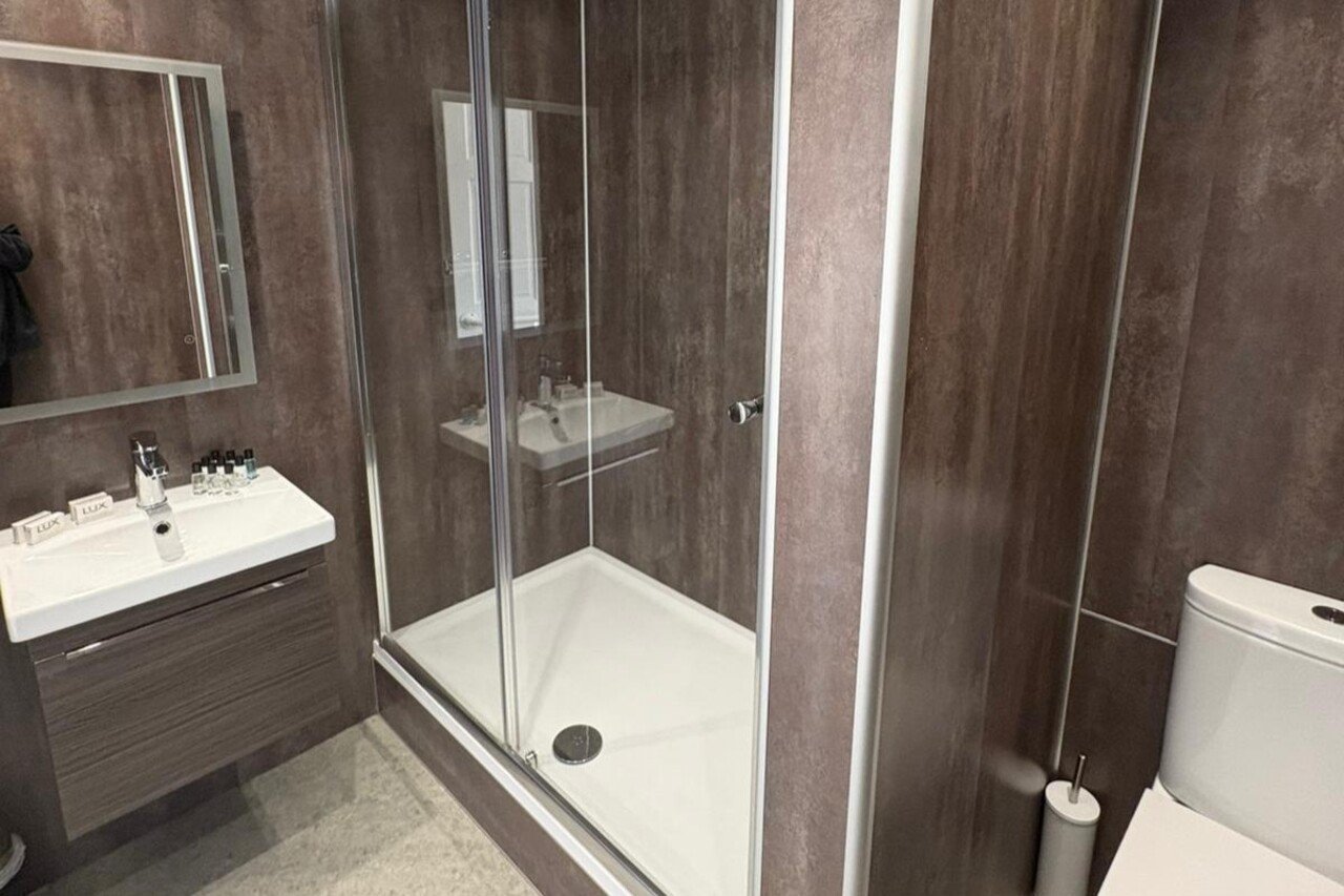 Wales Holiday Cottages | Furnished Apartment Urban Stay Wales-holiday-cottages-near-Swansea-for-groups.-Manor-Park-Country-House-sleeps-28,-ideal-for-family-breaks-and-South-Wales-holidays.
